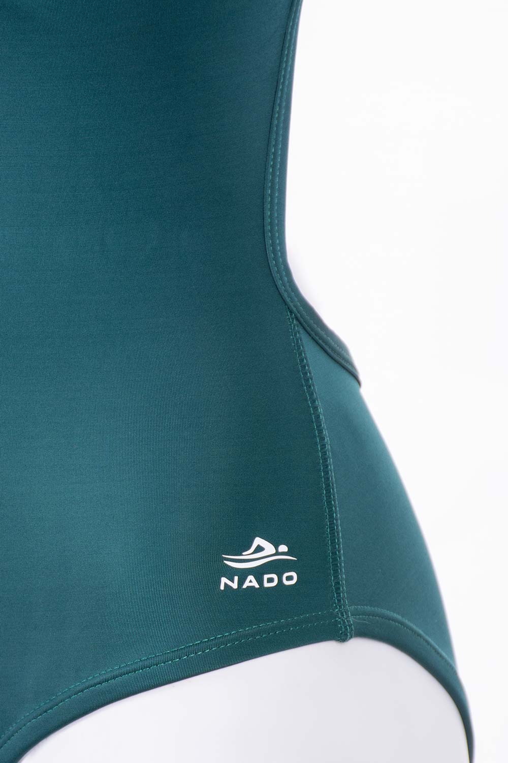 ENTERO DOBLE TIRA ESENCIAL VERDE OSCURO LOGO DETALLE